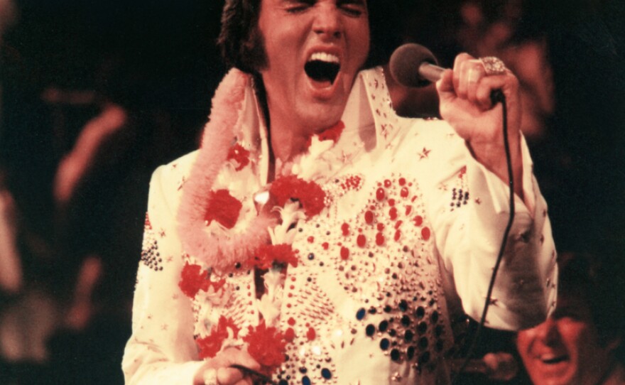 Elvis Presley, pictured performing live, made television history in 1973 with a live concert special, televised globally via satellite. Now, 40 years later, don’t miss one of the most outstanding concert performances of his career.
