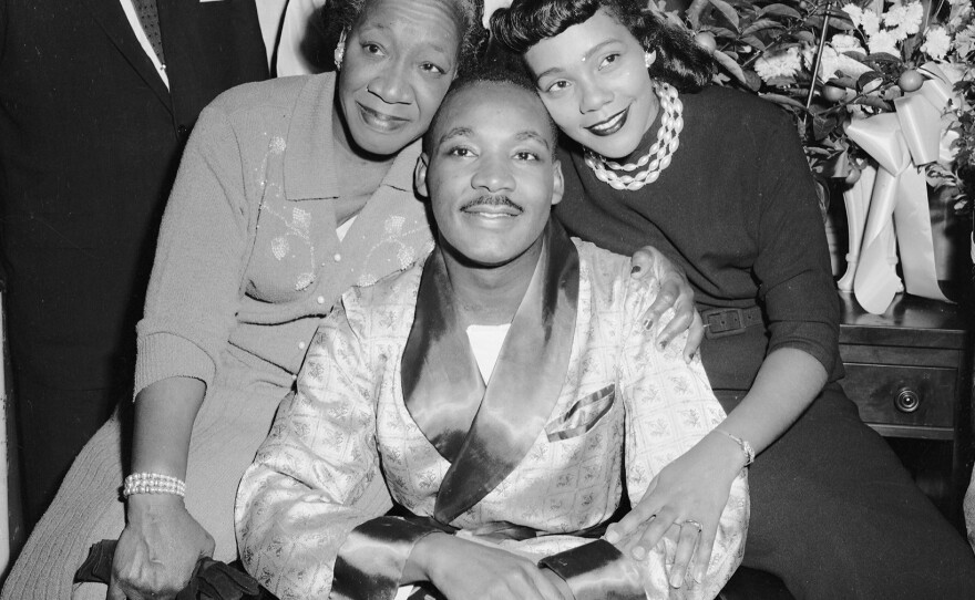 Alberta Williams King (left) with her son, Dr. Martin Luther King Jr. and daughter-in-law, Coretta Scott King on September 30, 1958.