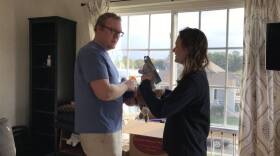 Anna and Evan Colby sharing a moment while packing their apartment in this undated photo. 
