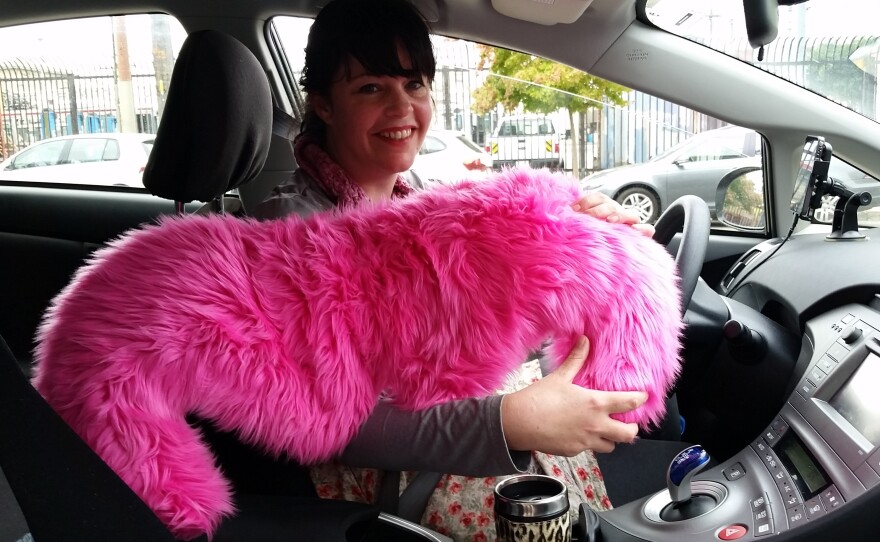 Lyft driver Danielle Kerley showcases the company's iconic mustache which is displayed on cars used in the service.