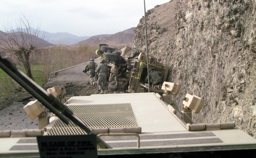 A mine-resistant, ambush-protected vehicle, or MRAP, that was leading a patrol in Afghanistan's Tangi Valley in 2009 was upended by a 500-pound homemade explosive. Minutes later, a rocket-propelled grenade hit the cliff wall above, initiating a firefight that pinned down Kit Parker and the rest of the platoon.