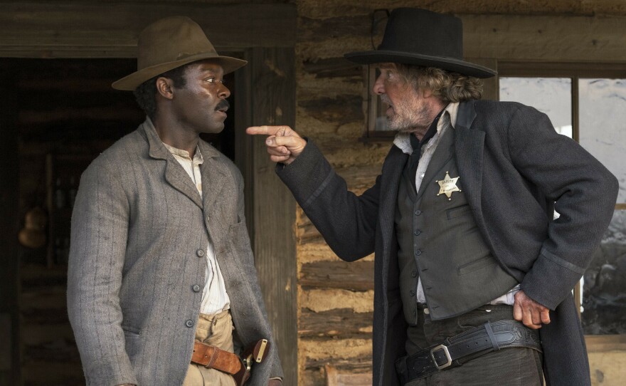 David Oyelowo as Bass Reeves and Dennis Quaid as Deputy U.S. Marshal Sherrill Lynn.