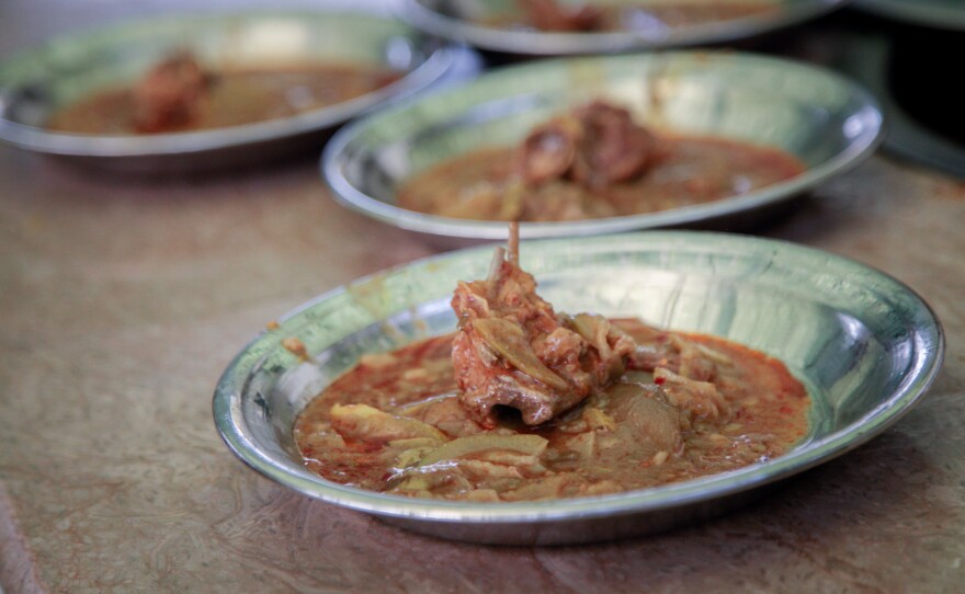 Meals of goat curry are served at a free cafeteria operated by the Pakistani charity Saylani. This cafeteria was recently opened to serve workers in the textile mills on the outskirts of the city of Faisalabad. It's one of 40 cafeterias the charity runs in Faisalabad – nearly double what they operated two years ago as the number of hungry grow.