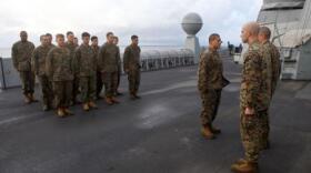 Cpl. Luis G. Rivera, center, a native of Brownsville, Texas, and radio operator with the 24th Marine Expeditionary Unit, receives a Certificate of Commendation aboard the USS New York, Dec. 9, 2012.
