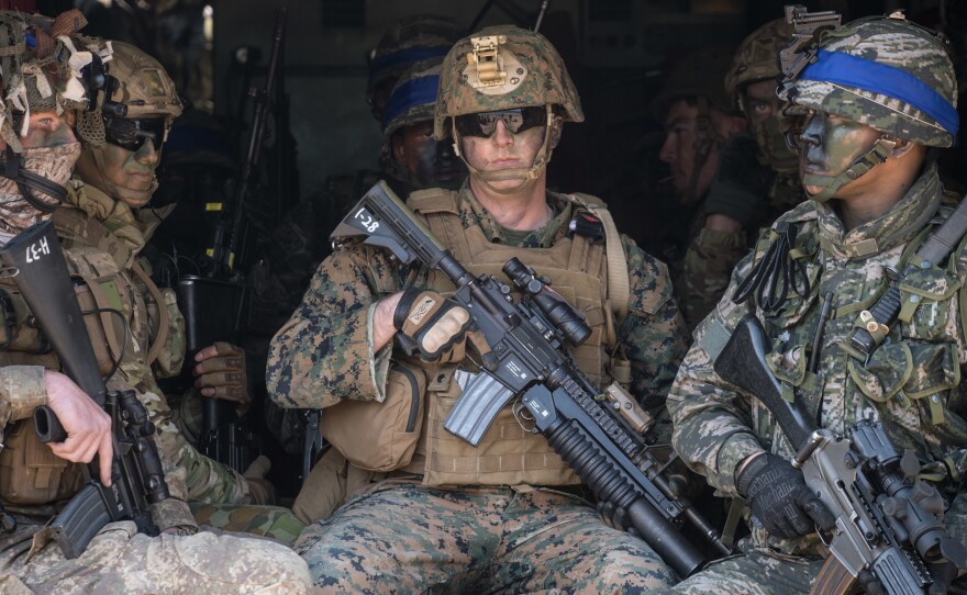 U.S. and South Korean soldiers sit inside an amphibious vehicle during an annual joint military landing exercise in Pohang, on South Korea's southeast coast, in March 2016.