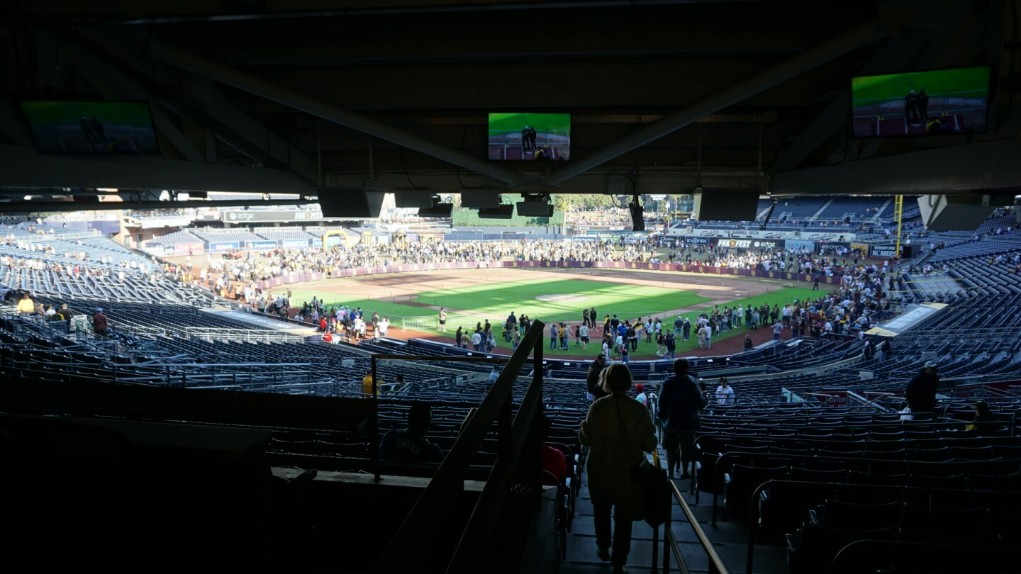 Fans walk toward the field at Petco Park during San Diego Padres Fanfest.