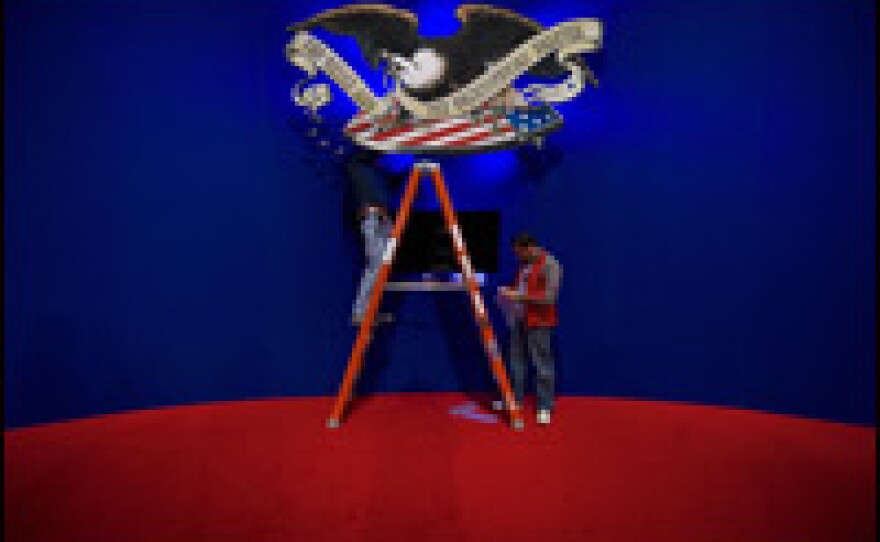Technicians make final preparations on the stage where the presidential candidates will debate on Oct. 6, 2008, in Nashville, Tenn. at Belmont University.