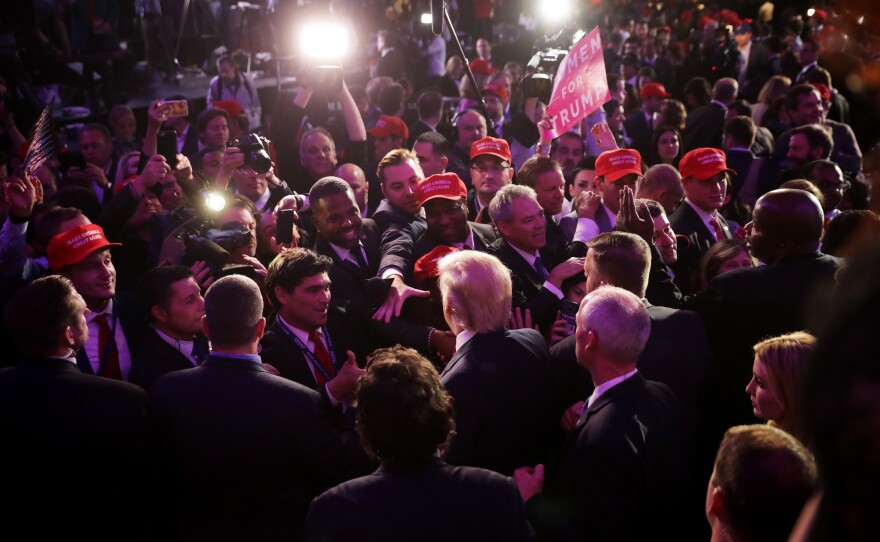 Donald Trump greets people in the crowd after delivering his acceptance speech.
