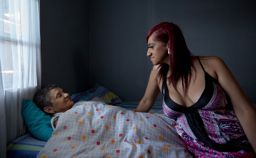 Chedino and her mother, Alma, share a quiet moment together on the day that Miss Trans Global was supposed to publish the winner and runners-up. Although they share a rocky past, there is much that connects Chedino and her mother — Alma is a former beauty queen herself, and she was one of the first to whom Chedino disclosed that she was transgender.