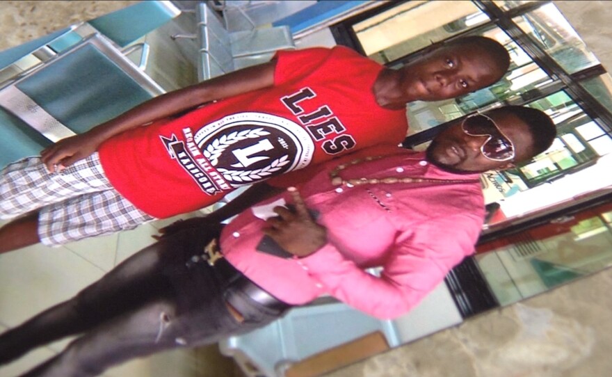 Sylvie shares an undated photograph her middle son (left) and a family member, July 5, 2017.