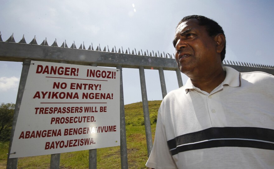 Desmond D'Sa stands by the landfill he helped shut down in Durban.