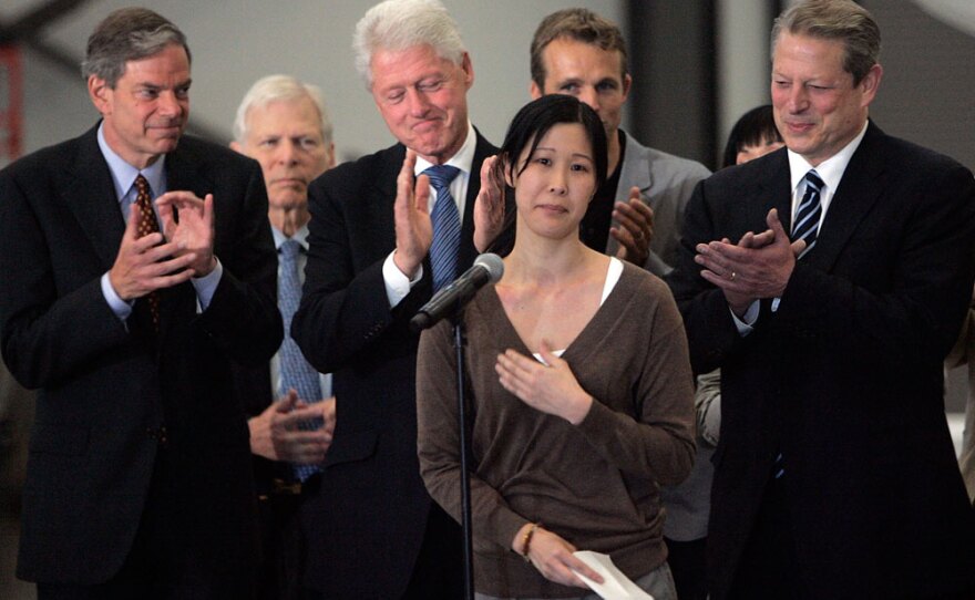 Laura Ling addresses a crowd gathered at the hangar.