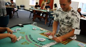 Tyler Baltz practices his table-dealing skills at Northamption Community College in Bethlehem, Pa. Baltz is one of 180 students enrolled in a training program that is helping meet growing demands for qualified dealers at casinos on the East Coast.