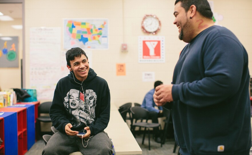 Noel Melecio, 15, talks with YMCA outreach worker John Vergara during a recent Urban Warriors session.