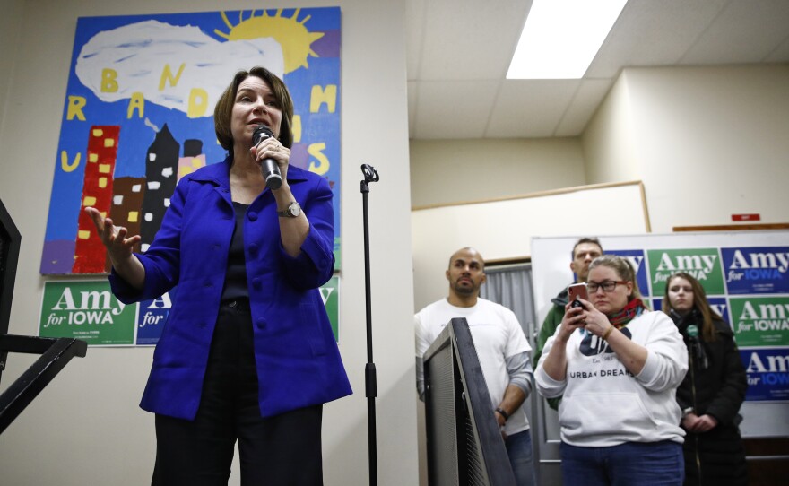 Democratic presidential candidate and Minnesota Sen. Amy Klobuchar speaks during a campaign event Sunday in Des Moines, Iowa. President Trump's impeachment trial will pull her and three other candidates off the trail at a critical juncture.