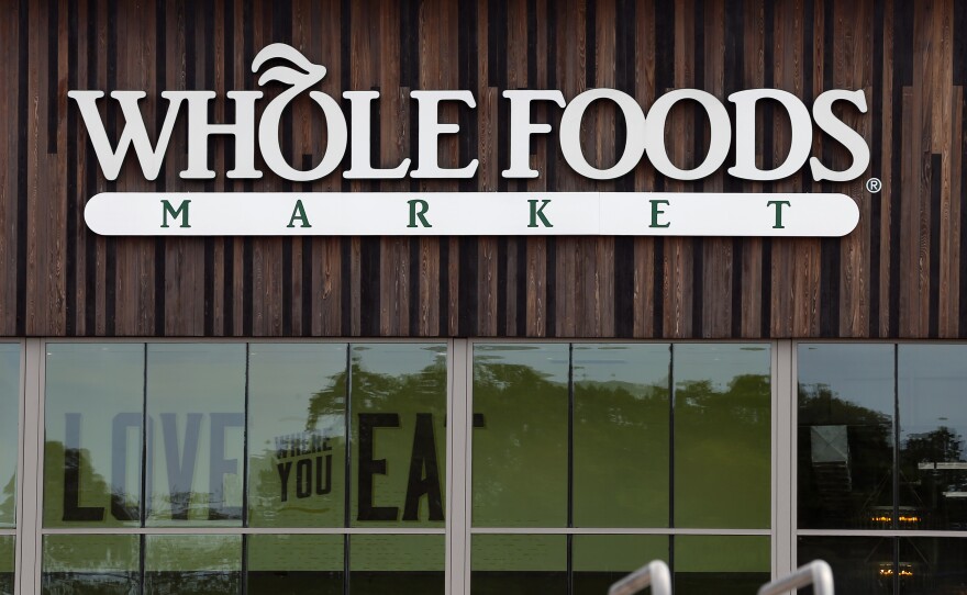 Whole Foods (pictured here in Jackson, Miss.) says it will pause purchases of Maine lobster for environmental reasons, but isn't pulling it from the shelves.