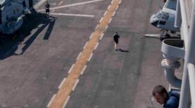  Sailors and Marines aboard amphibious assault ship USS Peleliu (LHA 5) run in a 5K "Turkey Trot" on November 22, 2012.