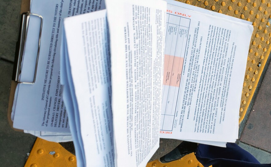 A petition on a clipboard outside a Target in San Diego, Feb. 11, 2020.