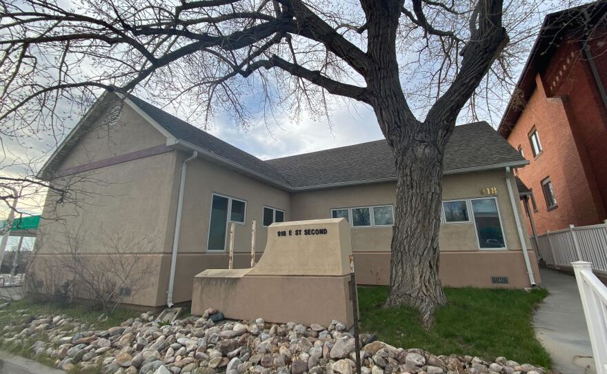 The future site of the Wellspring Wyoming Health Access clinic is a residential-style building sandwiched between a gas station and a small apartment house near downtown Casper, Wyoming.