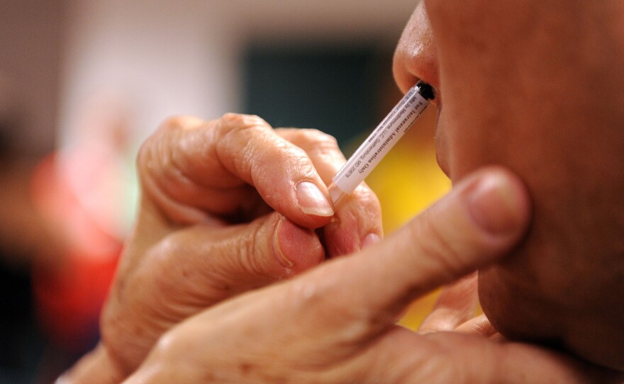 The nasal spray version of the flu vaccine contains live but weakened form of the virus. Researchers think there's a good chance this could help boost the body's immunity and improve its ability to fight off pathogens such as the coronavirus.