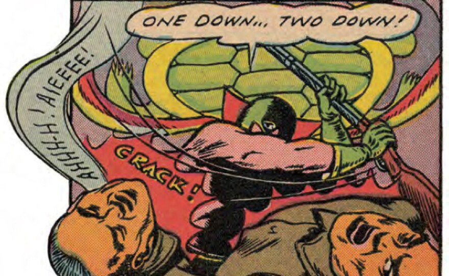 The Green Turtle's swinging arm obscures his face in this panel from <em>Blazing Comics</em>.