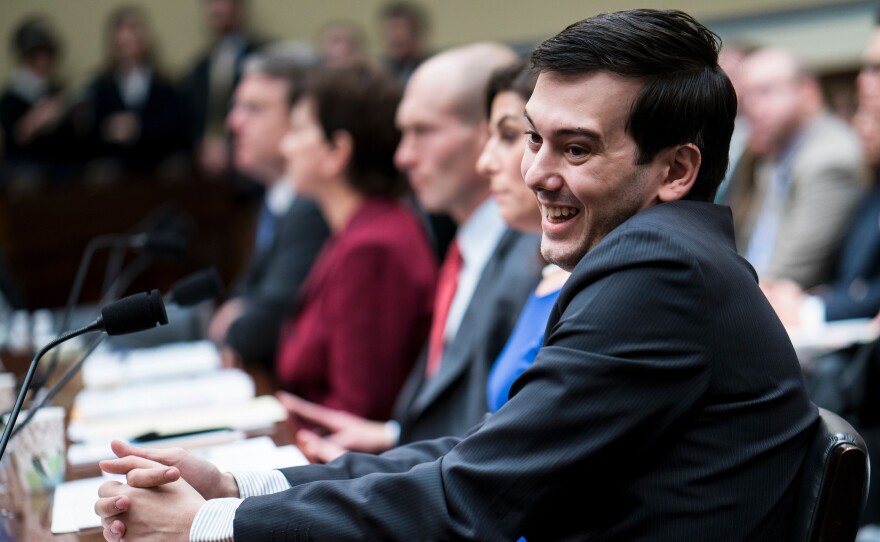 Entrepreneur and pharmaceutical executive Martin Shkreli laughs during a hearing of the House Oversight and Government Reform Committee on Capitol Hill on Thursday.
