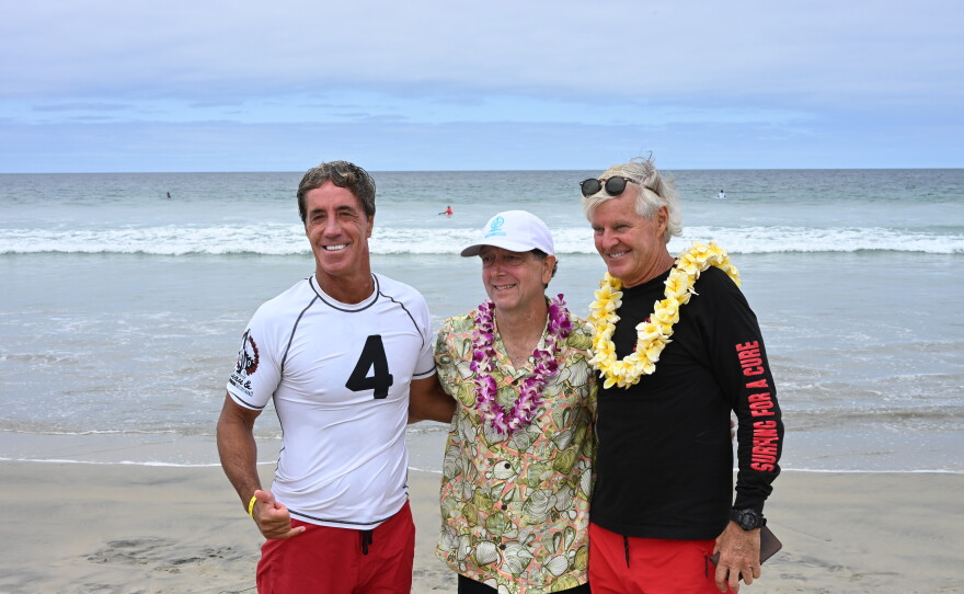 Jon Roseman, Kevan M. Shokat and Sam Armstrong pose for a photo near Scripps Pier, Aug. 15, 2026.