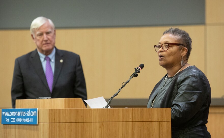 Public Health Officer Dr. Wilma Wooten speaks at a San Diego County news conference with Board of Supervisors Chairman Greg Cox, March 19, 2020.