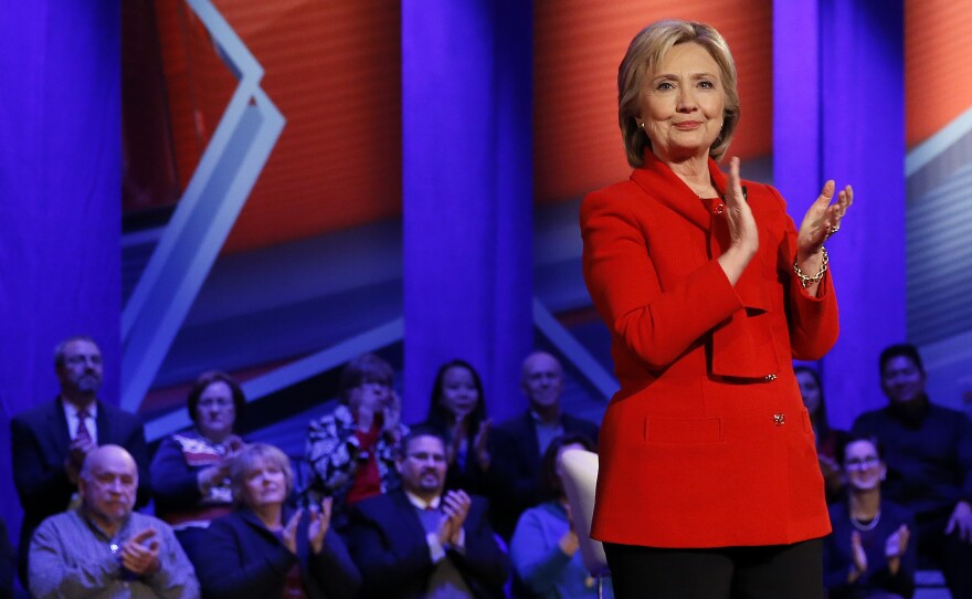 Democratic presidential candidate Hillary Clinton applauds after a CNN town hall at Drake University in Des Moines, Iowa, on Monday.