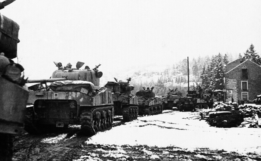 British tanks move to support their infantry during the Battle of the Bulge.