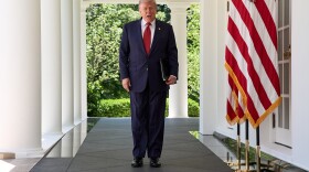 President Donald Trump walks through the Colonnade of the White House as he arrives to attend a luncheon for mothers Friday, May 8, 2026, in the Rose Garden of the White House, in Washington.