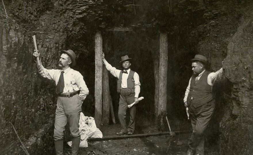 John CC Mayo (center) and his colleagues consolidate ownership of natural resources in the late 1800s.