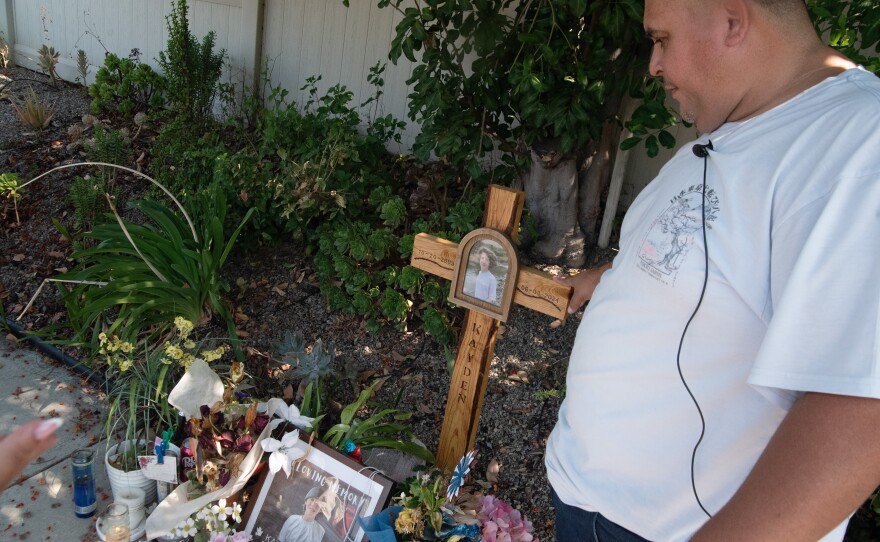 Community advocate, Agner Medrano, looks over a memorial site in Escondido, Calif. July 25, 2024.