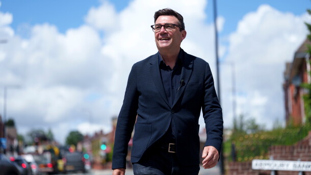 Andy Burnham smiles during a campaign visit to Ashton-in-Makerfield before a by-election, in Manchester, England, on June 9. Burnham is expected to succeed Keir Starmer as the U.K.'s Labour Party leader and prime minister.