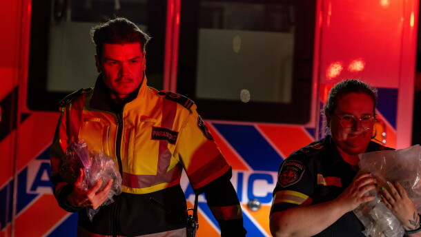 Paramedics work at the Wainwright Health Centre as injured military members are treated after a fire at Canadian Forces Base Wainwright, outside of Wainwright, Alberta Saturday, Oct. 17, 2026.