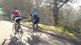 Two bicyclists are shown riding uphill in Torrey Pines on Feb. 4, 2015. 
