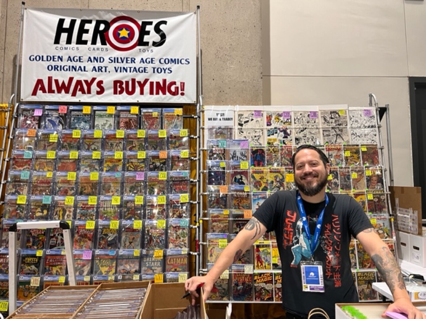 Jarrod Pagan from Heroes, a comic book store in Campbell, Calif., poses at the store's booth on July 28, 2024. San Diego Convention Center.