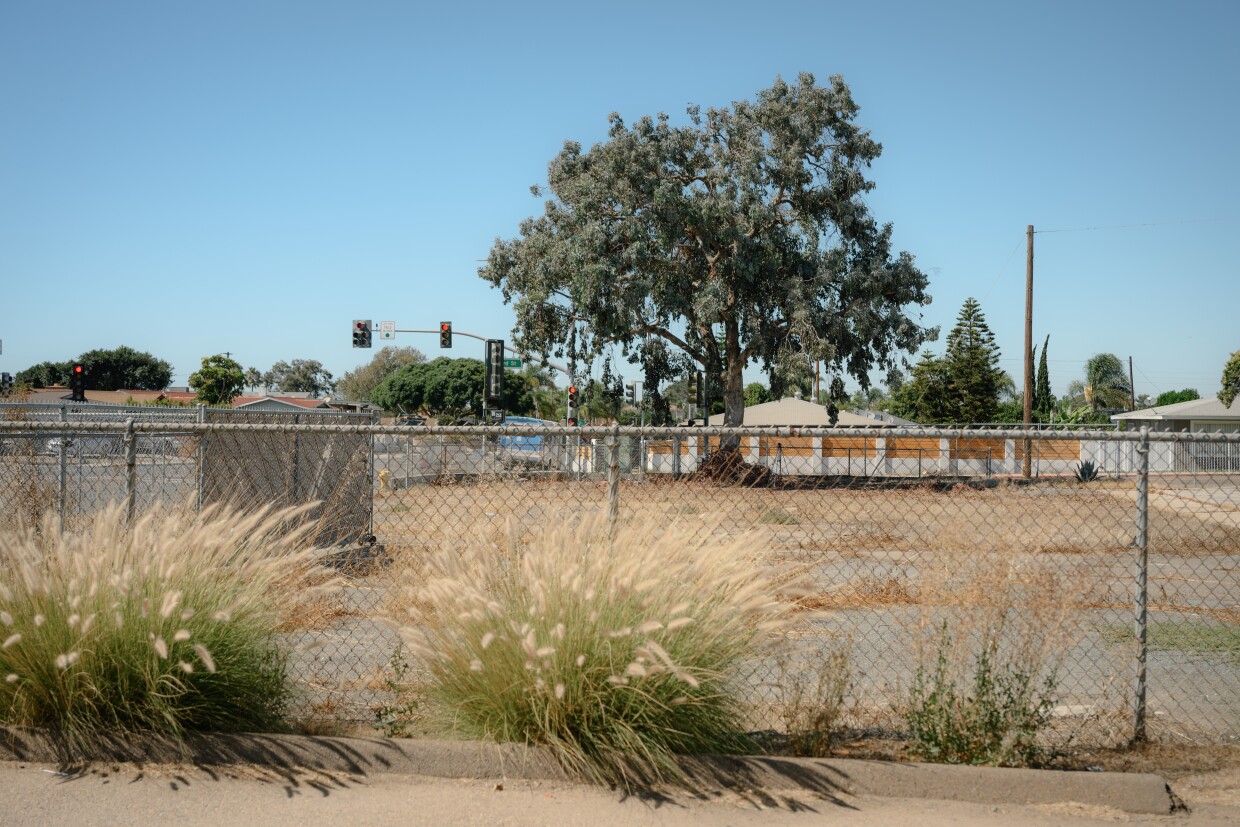 A vacant lot sits empty at the corner of Oxford and Fourth in Chula Vista, California on Sept. 8, 2025. City officials are exploring turning this lot into a new park one of relatively few on the western side of the city.