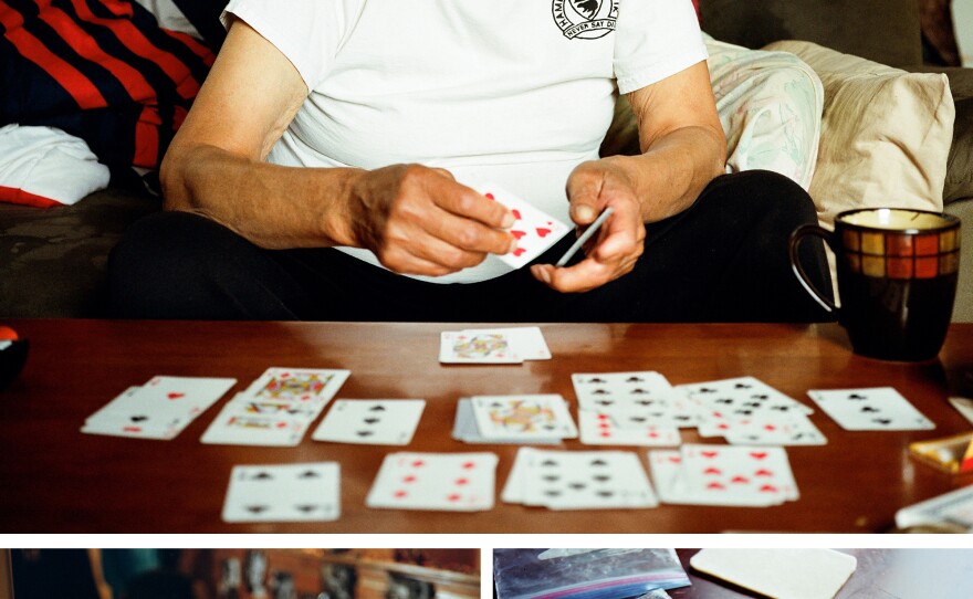 Top: Bruce's brother-in-law Walter Inglangasak plays solitaire in his home in Aklavik. Left: Photos of Bruce Inglangasak running around a truck as a polar bear chases him. Right: Cindy Arey works on slippers she is making in her home in Aklavik. Cindy's partner is Bruce's brother, Lenard Inglangasak.