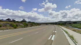 One of the few cycle tracks in San Diego is found on this stretch of Friars Road, where a short concrete barrier separates car and bike traffic.  
