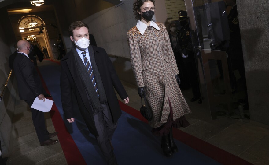Cole Emhoff (left) and Ella Emhoff, the stepchildren of Vice President Harris, arrive for the inauguration at the Capitol.