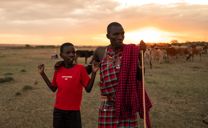 Massai Lion Ambassador Michael Sumare and his son, Sankale.