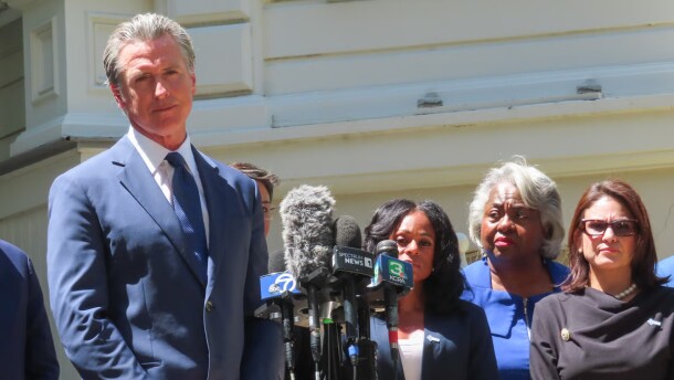 California Governor Gavin Newsom is joined by Democrats in the Texas state legislature Friday, July 25, 2025, outside the Governor's Mansion in Sacramento.