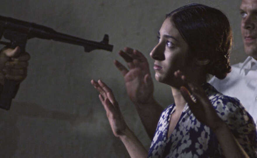 Noor Inayat Khan (Grace Srinivasan) is captured.