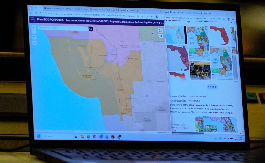 A senator's laptop displays a Congressional Redistricting Plan during debate before its passage in the Florida Senate.