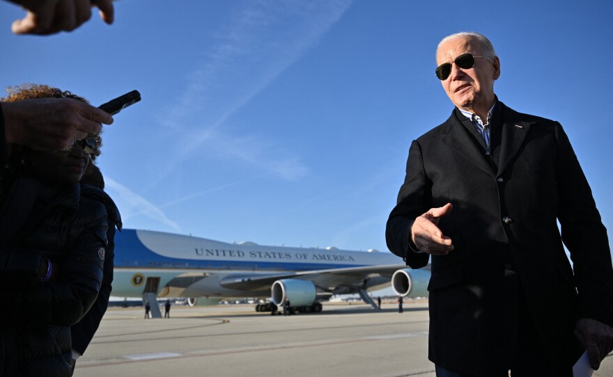 President Biden speaks to reporters in Milwaukee before boarding Air Force One on Wednesday. The president announced Friday he would expand pardons for simple marijuana possession.
