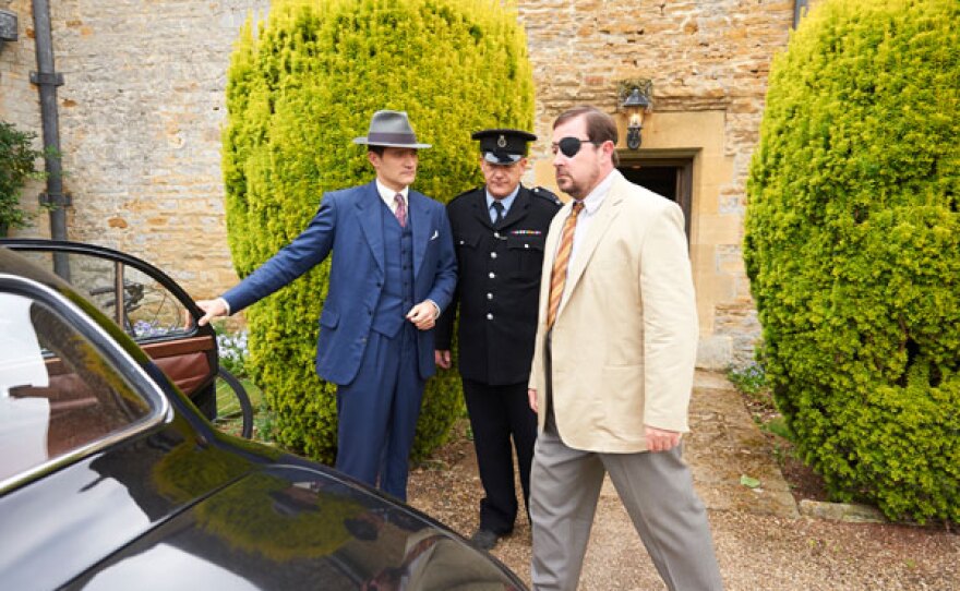 Inspector Sullivan (Tom Chambers) arrests the Colonel (Daniel Ryan).