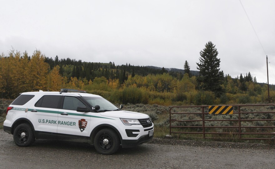 A U.S. Park Ranger vehicle drives in the Spread Creek area in the Bridger-Teton National Forest, just east of Grand Teton National Park off U.S. Highway 89, on Sunday, in Wyoming. Authorities say they have found a body believed to be Gabrielle "Gabby" Petito, who went missing on a trip with her boyfriend.