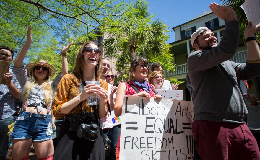 Protesters at the College of Charleston rally against proposed state budget cuts on April 21.