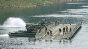U.S. Army soldiers try to dismantle a floating bridge during a training exercise on a river in Yeoncheon, South Korea, near the border with North Korea, Thursday, Aug. 20, 2026.